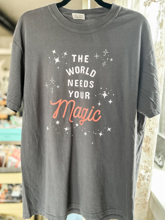 NK-The Wold Needs Your Magic Graphic Tee