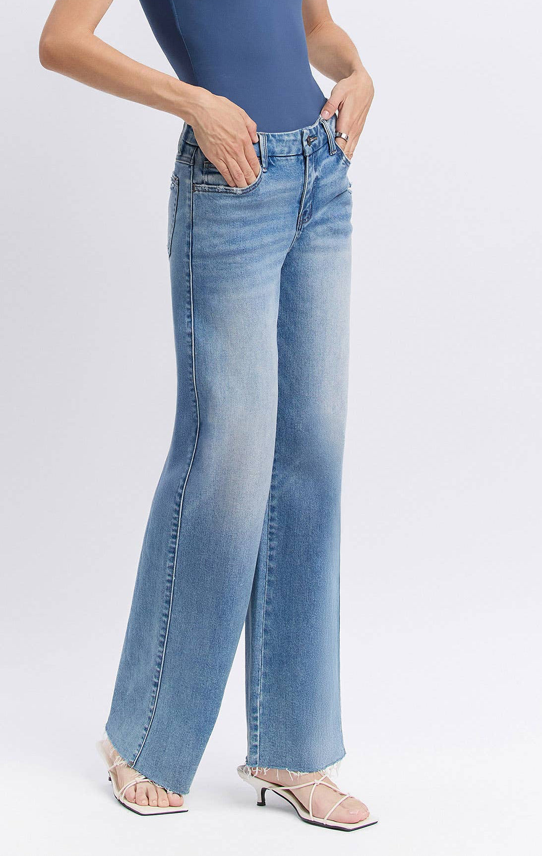 MID RISE CLEAN CUT RAW HEM WIDE JEANS